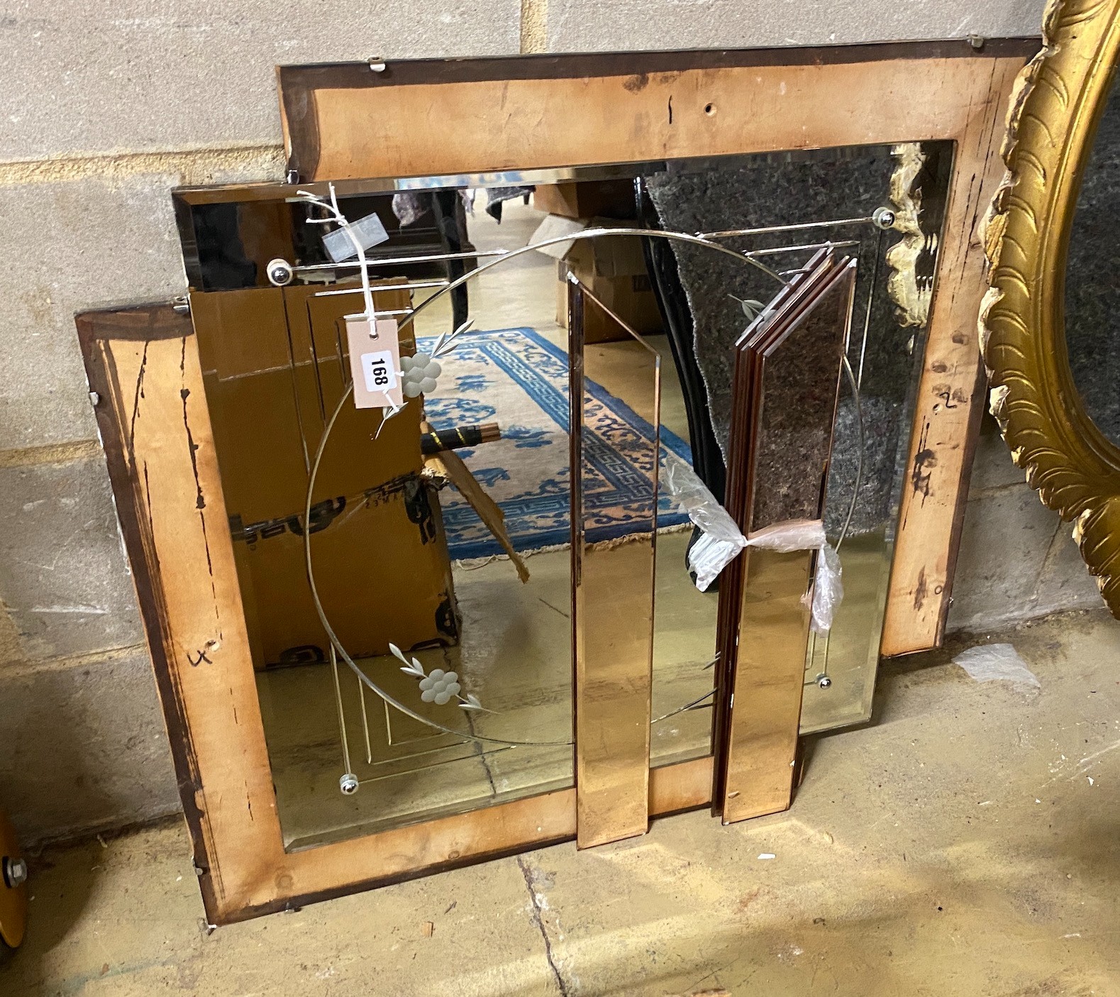 An Art Deco style peach and clear glass wall mirror, width 78cm, height 77cm